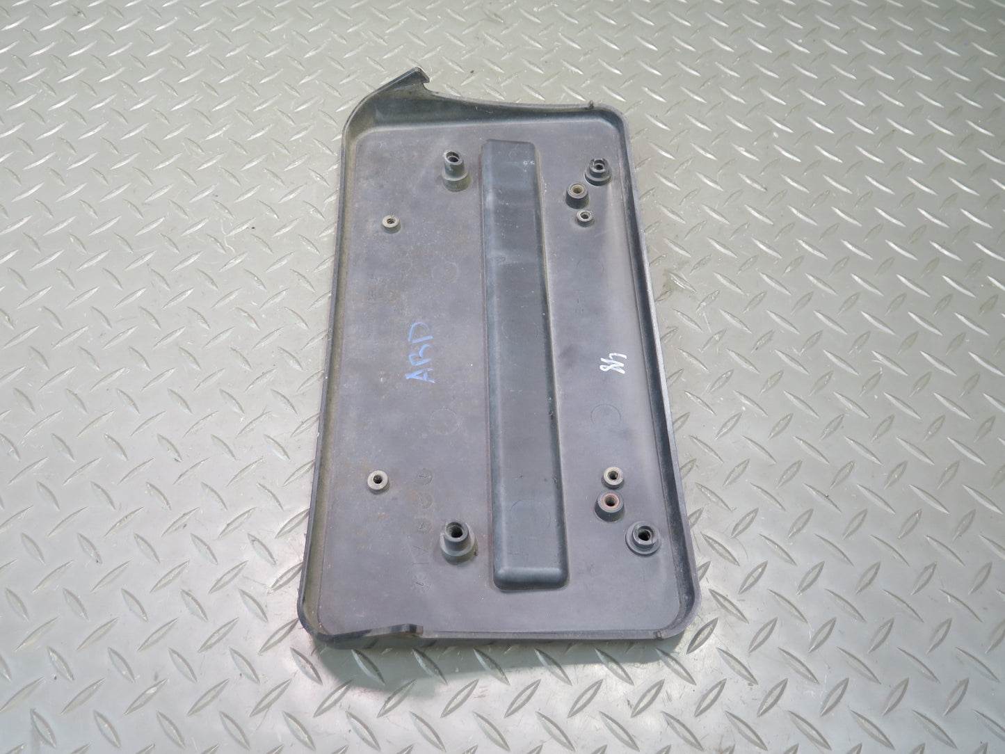 01-06 BMW E46 330ci Front Bumper License Plate Cover Panel Black 7065471 OEM