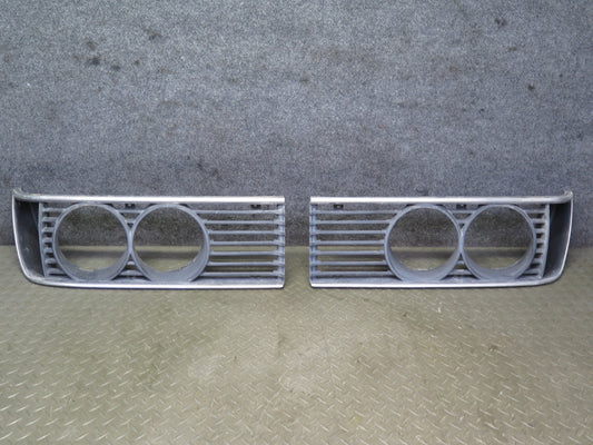 83-87 BMW E24 6-SERIES Set of 2 Front Left & Right Headlight Trim Grille OEM