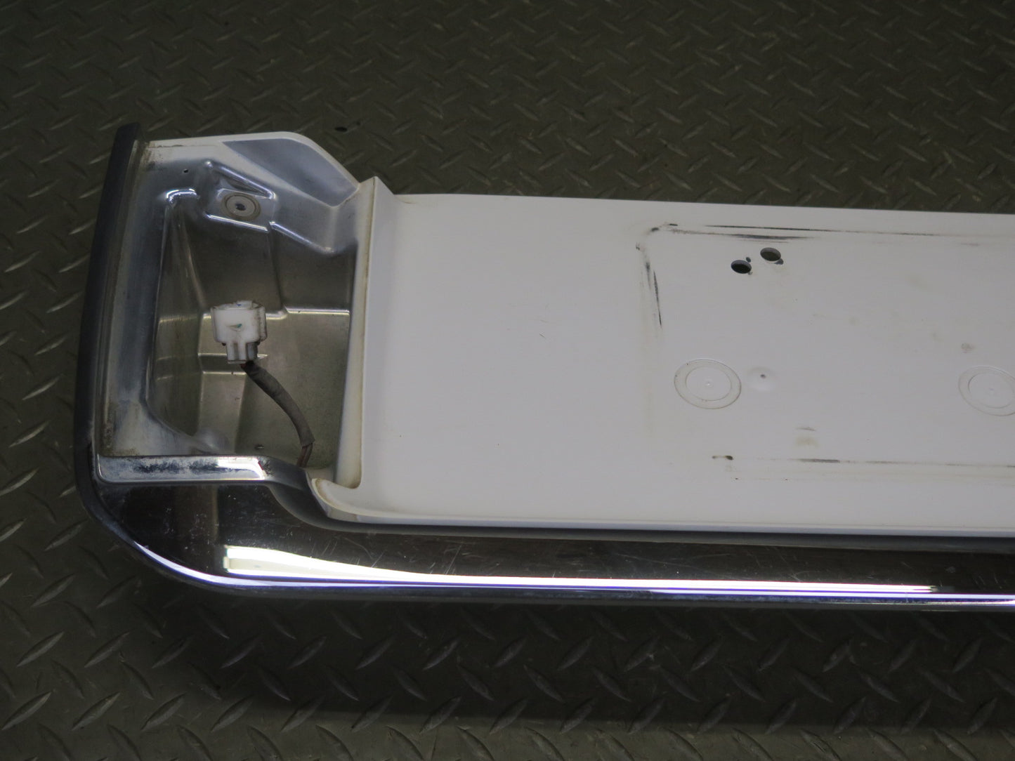 2003-2007 Lexus UZJ100L LX470 Rear Trunk Lid License Plate Molding Panel
