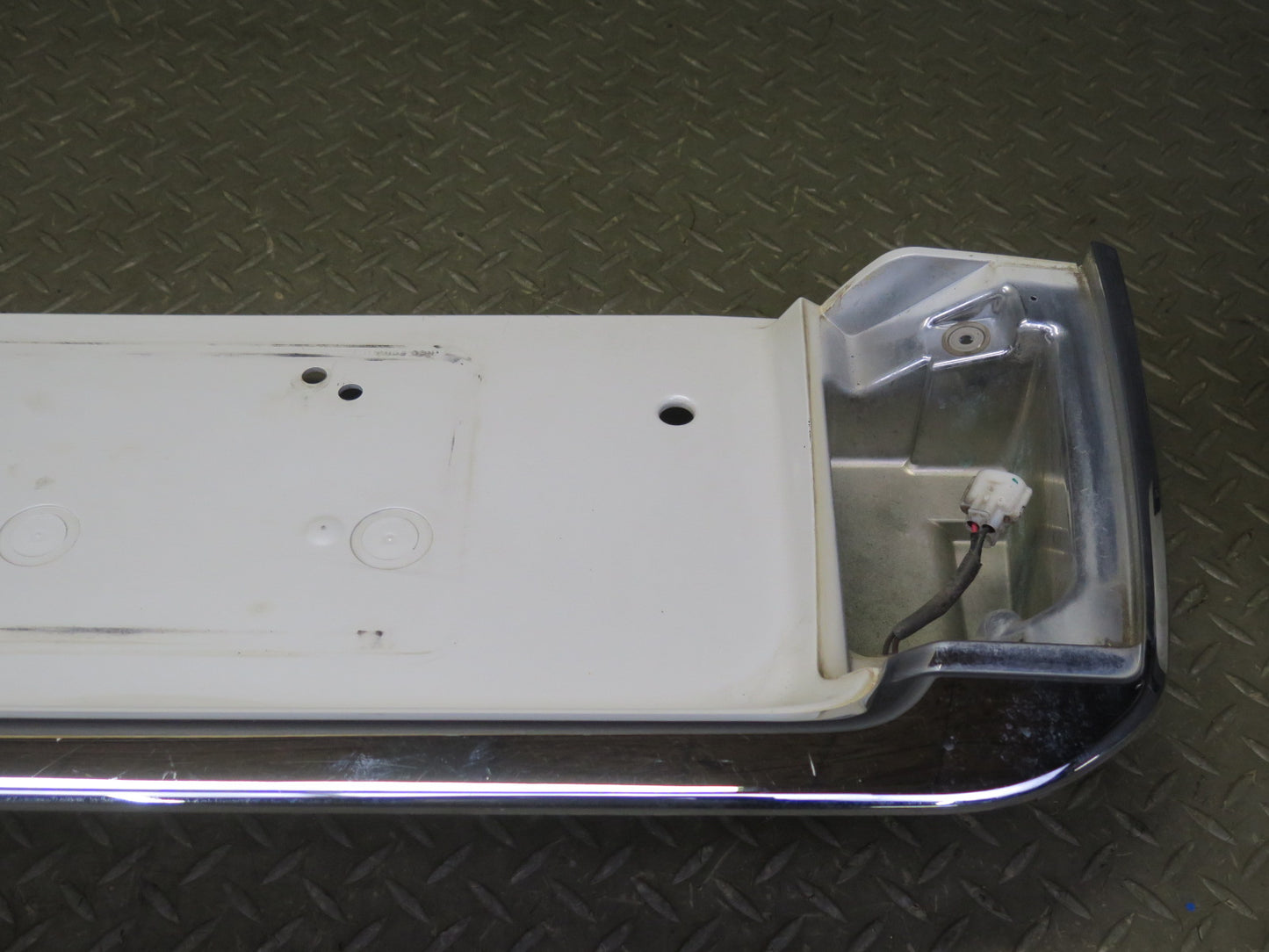 2003-2007 Lexus UZJ100L LX470 Rear Trunk Lid License Plate Molding Panel