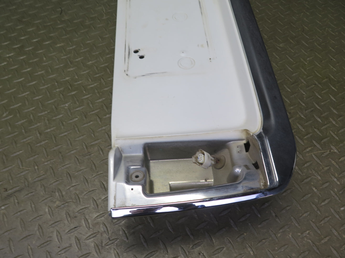 2003-2007 Lexus UZJ100L LX470 Rear Trunk Lid License Plate Molding Panel