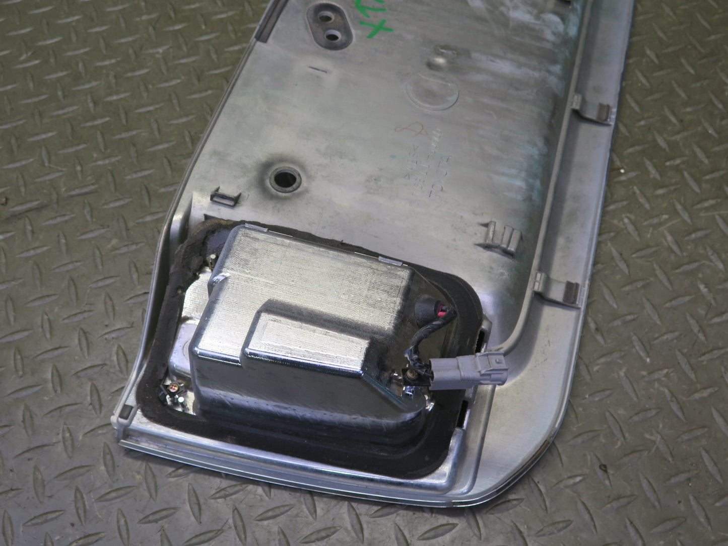 2003-2007 Lexus UZJ100L LX470 Rear Trunk Lid License Plate Molding Panel