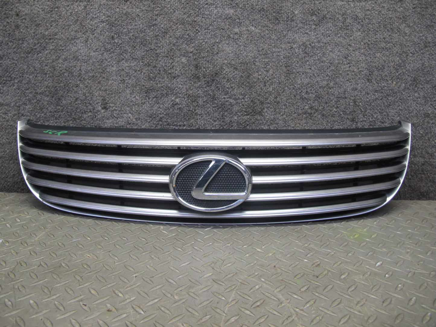 02-05 Lexus SC430 UZZ40L Front Bumper Grille Trim w Emblem OEM