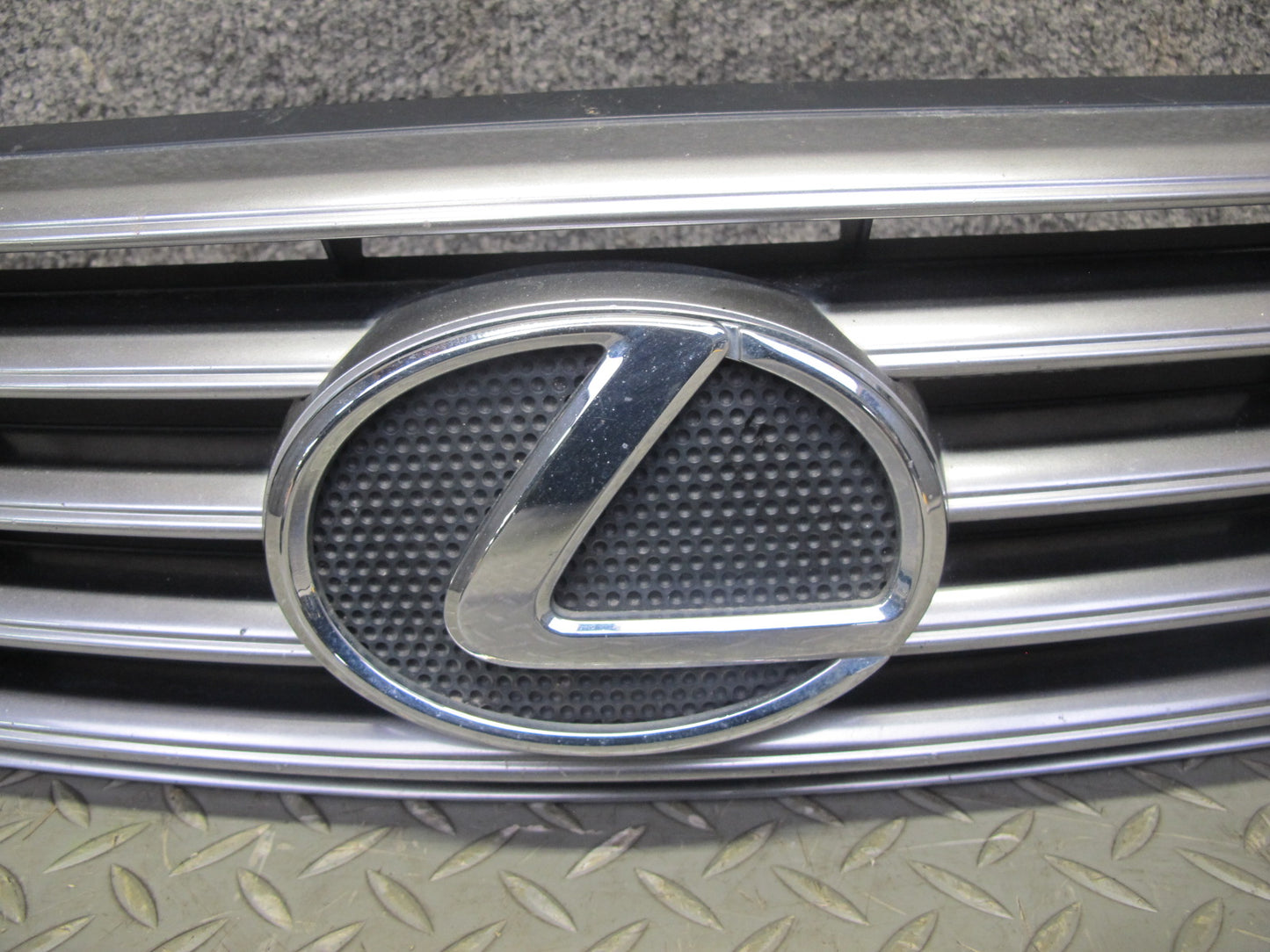 02-05 Lexus SC430 UZZ40L Front Bumper Grille Trim w Emblem OEM