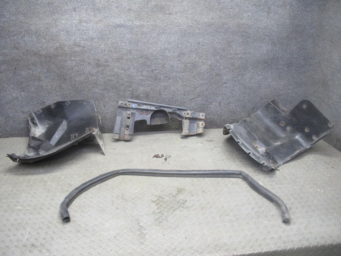 84-87 Chevrolet Corvette C4 Front Left Wheel Arch Fender Splash Guard Set OEM