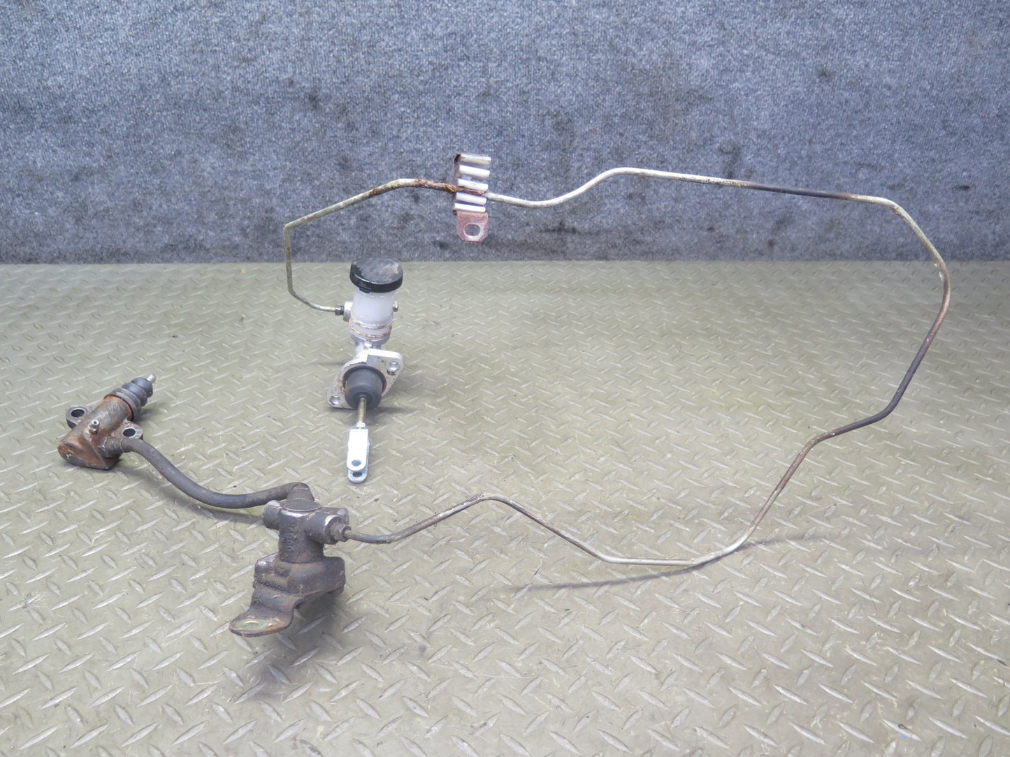 84-86 Nissan Z31 300ZX Turbo Set of 2 Master & Slave Clutch Cylinder w Lines OEM