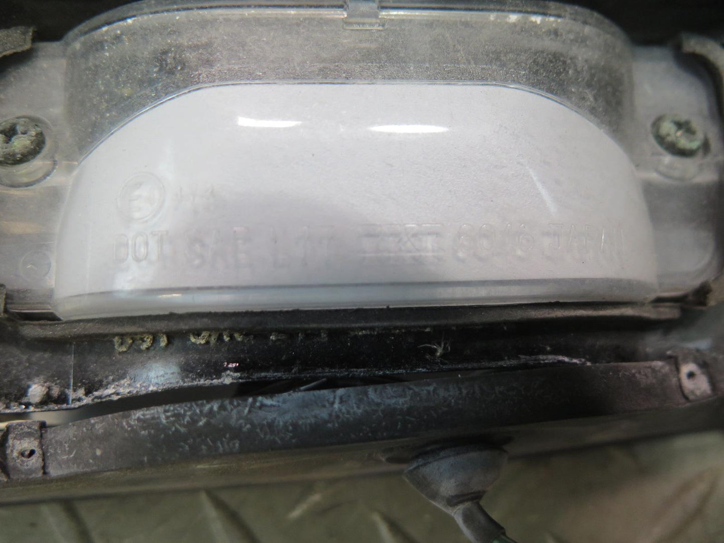 79-83 Datsun 280ZX S130 Rear License Plate Light TAG Trunk Trim Black OEM