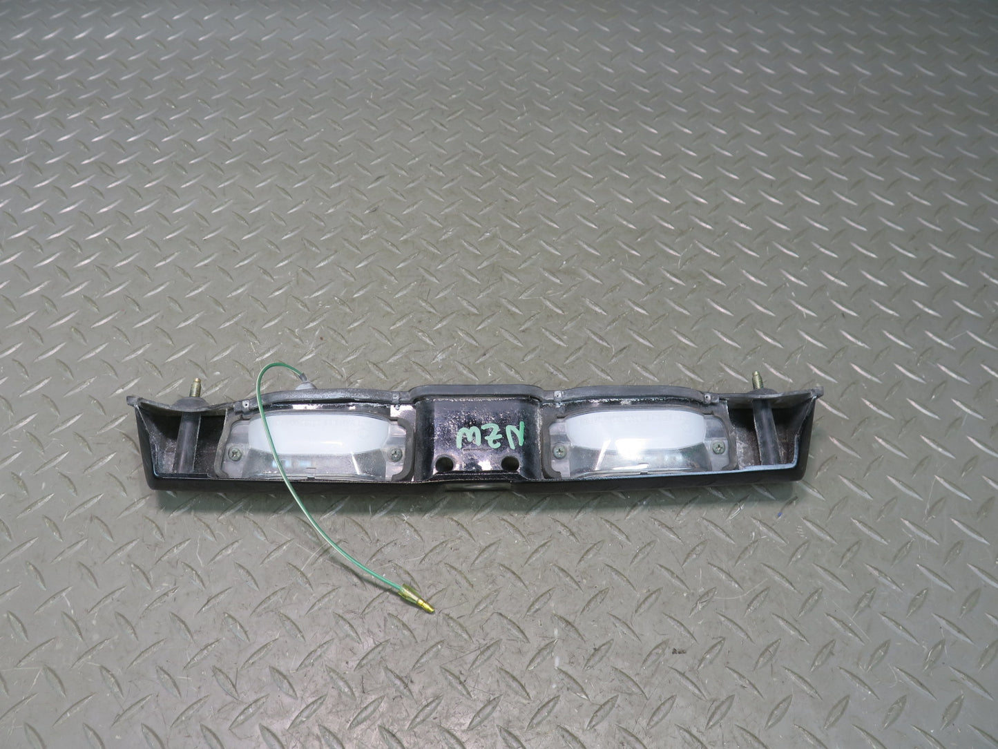79-83 Datsun 280ZX S130 Rear License Plate Light TAG Trunk Trim Black OEM