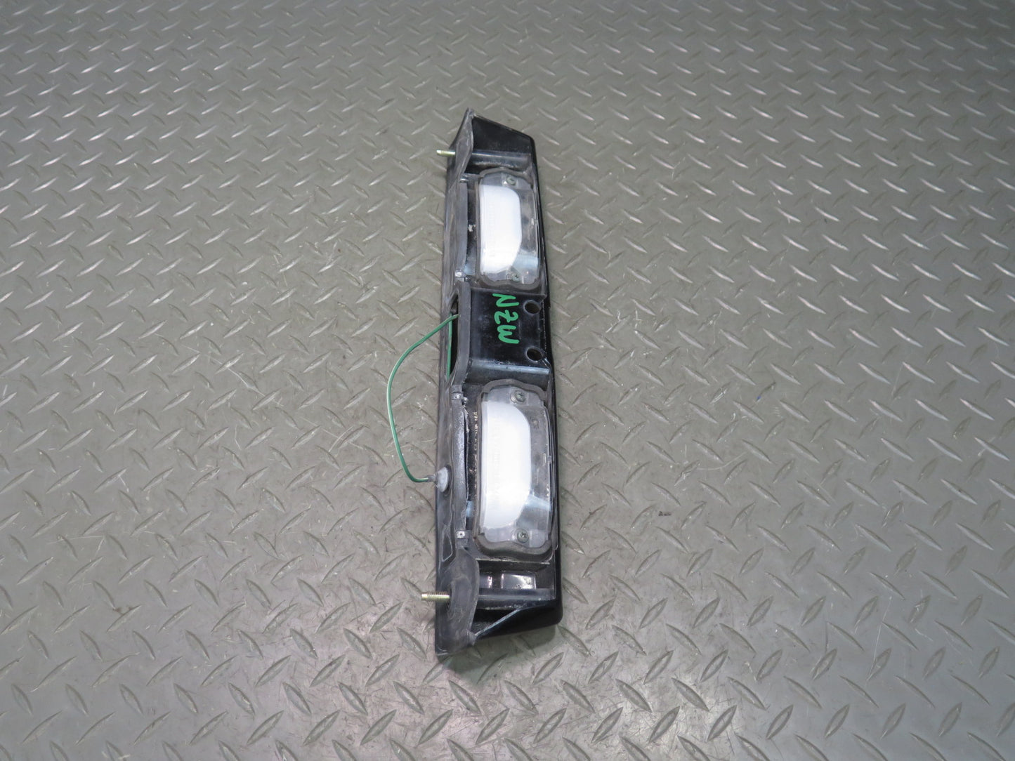 79-83 Datsun 280ZX S130 Rear License Plate Light TAG Trunk Trim Black OEM