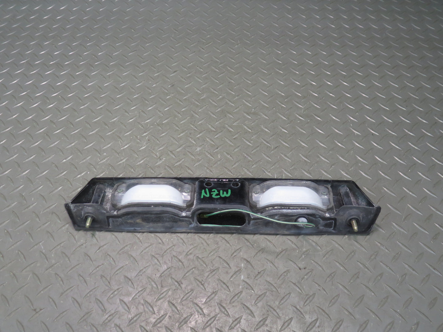 79-83 Datsun 280ZX S130 Rear License Plate Light TAG Trunk Trim Black OEM