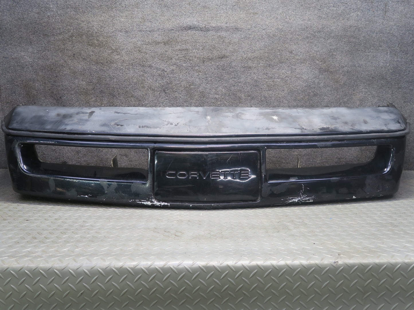 84-90 Chevrolet Corvette C4 Front Bumper Cover w License Plate Cover Black OEM