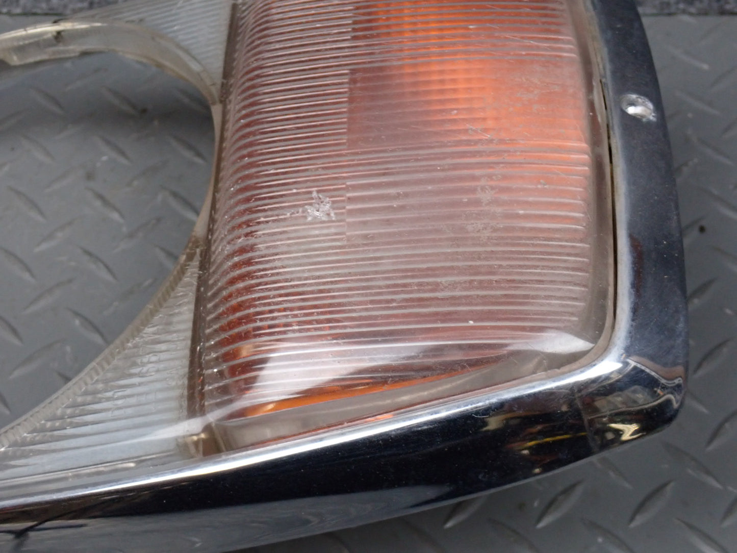 75-76 Mercedes W115 300D Front Left Headlight Trim Bezel w Turn Light OEM