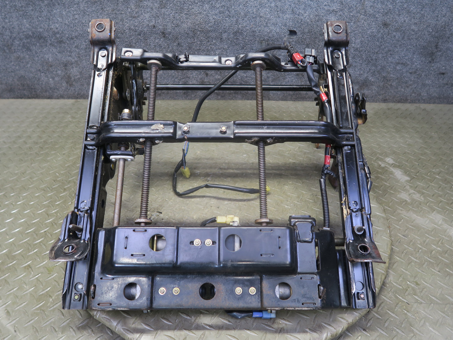 86-88 Toyota Supra MA70L Front Left Seat Lower Frame Track w Motors OEM