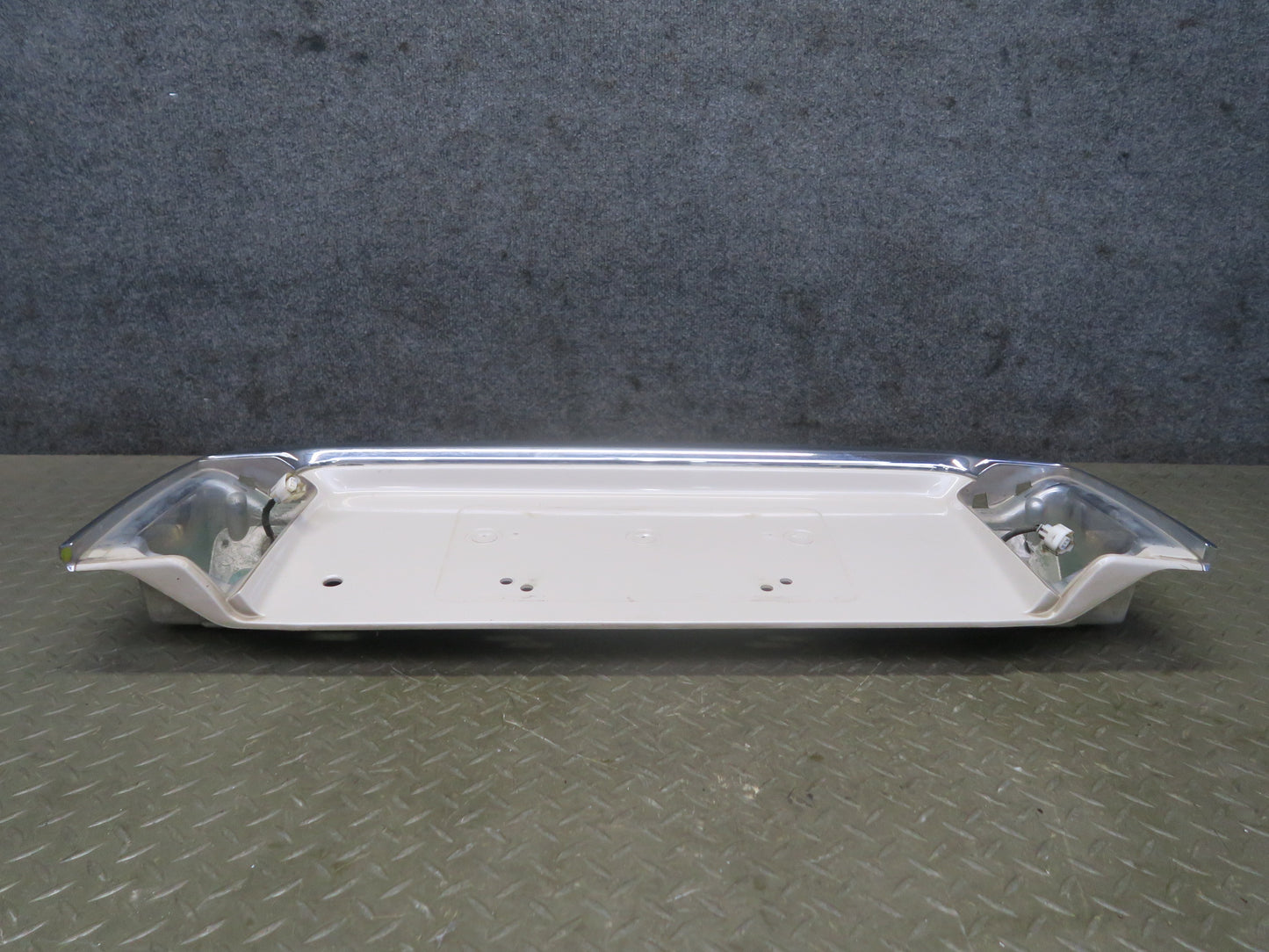 2003-2007 Lexus UZJ100L LX470 Rear Trunk Lid License Plate Molding Panel