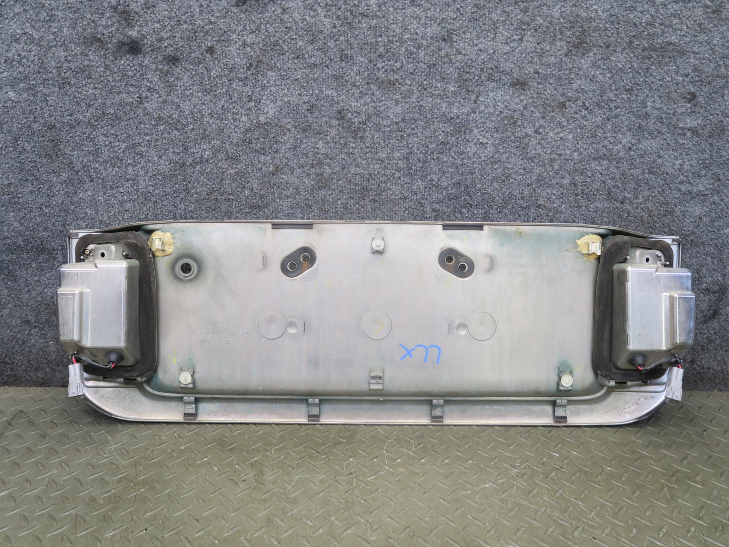 2003-2007 Lexus UZJ100L LX470 Rear Trunk Lid License Plate Molding Panel