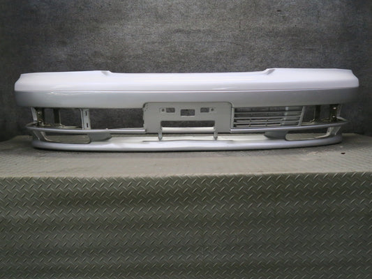 95-97 Nissan Gloria HY33 Front Bumper Cover White w Silver & Mounting OEM