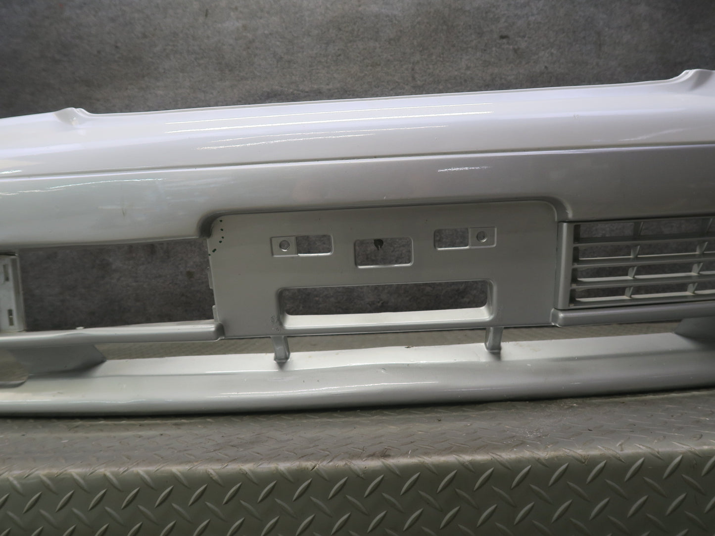 95-97 Nissan Gloria HY33 Front Bumper Cover White w Silver & Mounting OEM