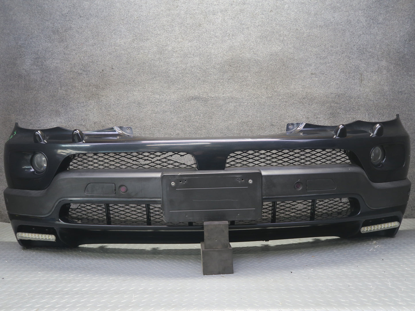 04-06 BMW E53 X5 4.8is Front Bumper Cover Black w Fog Lights PDC Sensors OEM