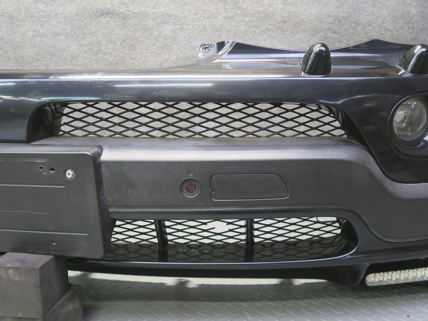 04-06 BMW E53 X5 4.8is Front Bumper Cover Black w Fog Lights PDC Sensors OEM