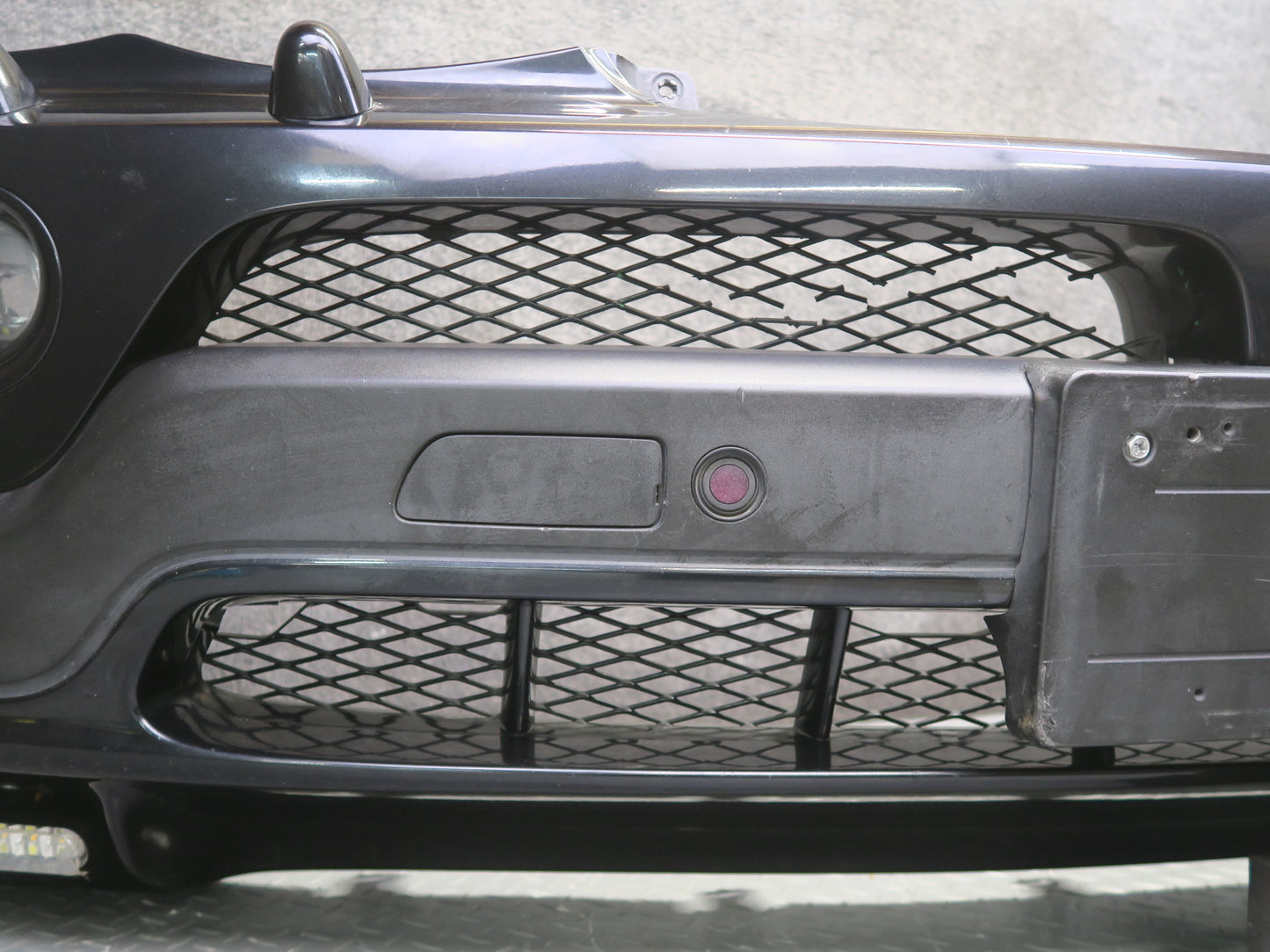 04-06 BMW E53 X5 4.8is Front Bumper Cover Black w Fog Lights PDC Sensors OEM