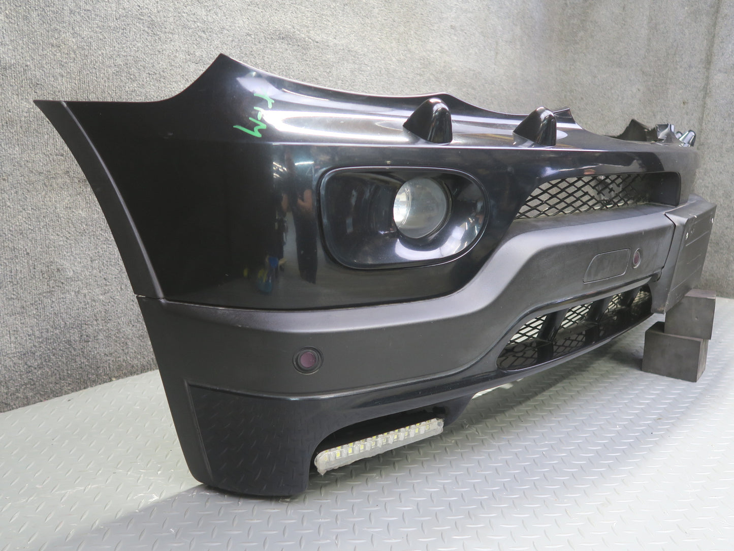 04-06 BMW E53 X5 4.8is Front Bumper Cover Black w Fog Lights PDC Sensors OEM
