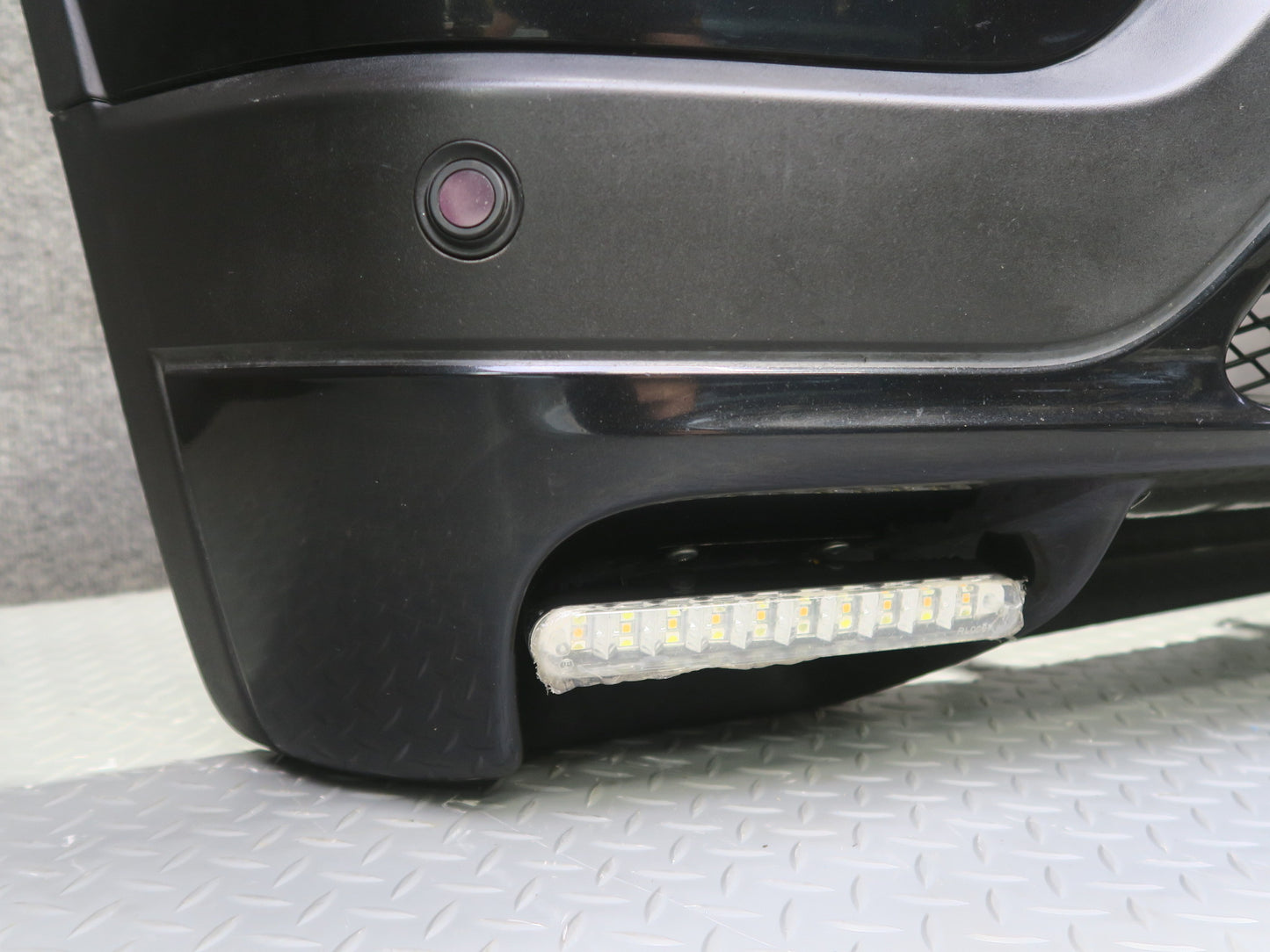 04-06 BMW E53 X5 4.8is Front Bumper Cover Black w Fog Lights PDC Sensors OEM