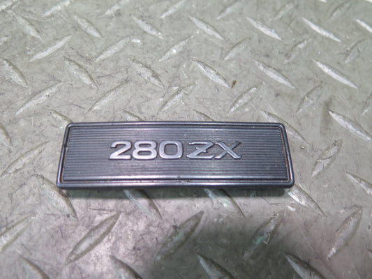 79-83 Datsun Nissan 280ZX S130 NA Center Console Emblem OEM