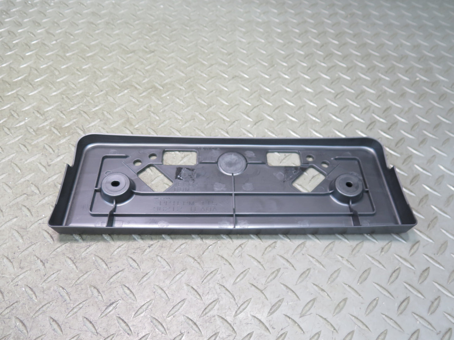 09-20 Nissan 370Z Z34 Front Bumper License Plate Bracket Holder 96212-1EA0A OEM