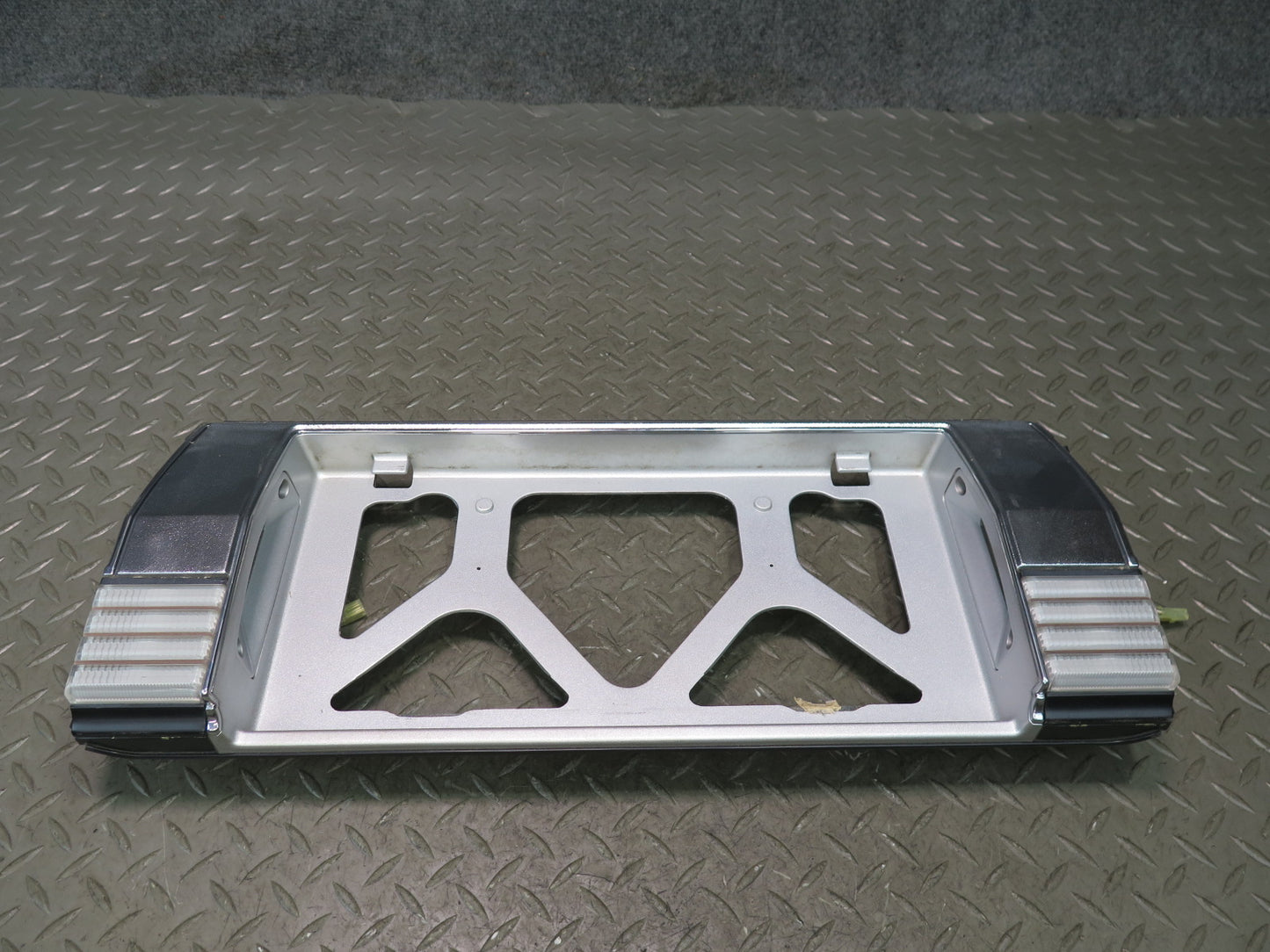 85-88 Toyota Cressida MX73 Sedan License Plate Panel w Light 75803-22120 OEM