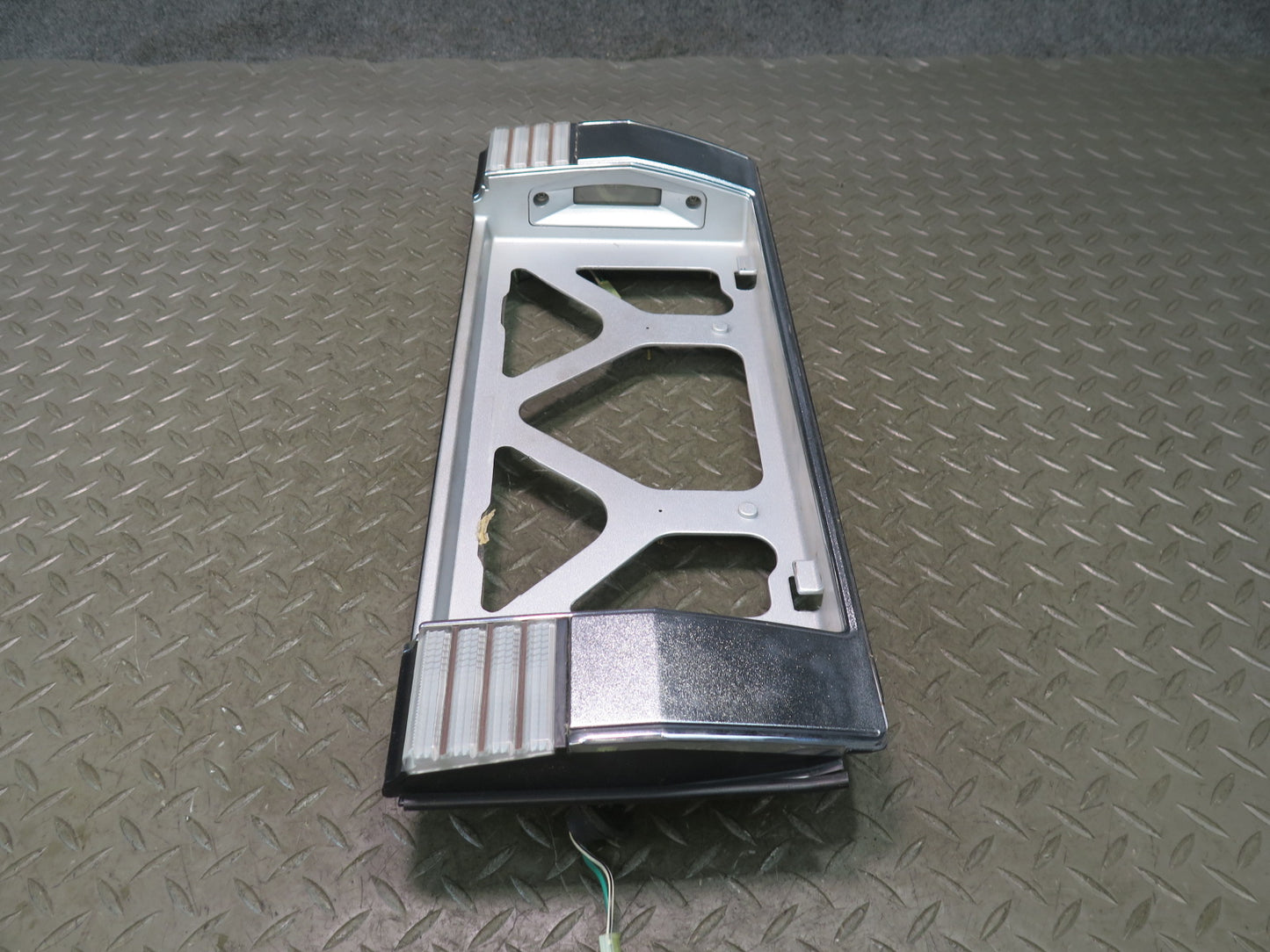 85-88 Toyota Cressida MX73 Sedan License Plate Panel w Light 75803-22120 OEM