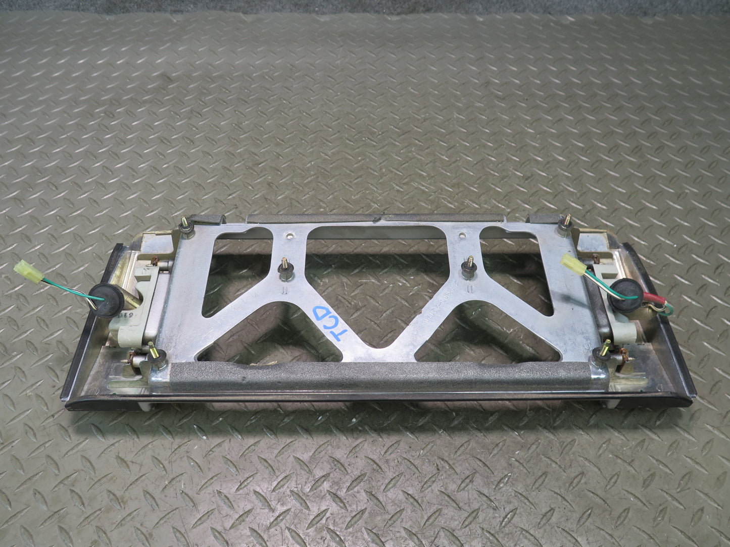 85-88 Toyota Cressida MX73 Sedan License Plate Panel w Light 75803-22120 OEM