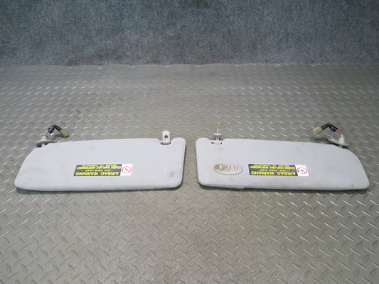 02-05 Lexus JCE10L IS300 Set of 2 Front Left & Right Sun Visor w Homelink OEM