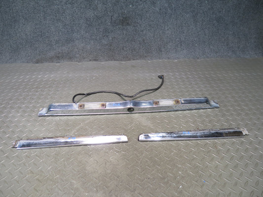 73-89 Mercedes R107 Rear Trunk Lid License Plate Light Chrome Molding Set OEM