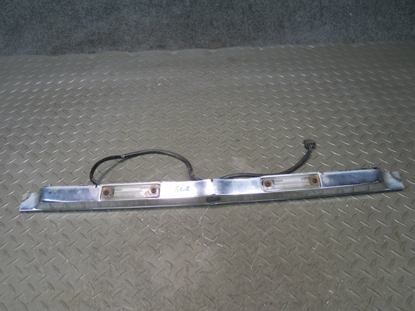 73-89 Mercedes R107 Rear Trunk Lid License Plate Light Chrome Molding Set OEM