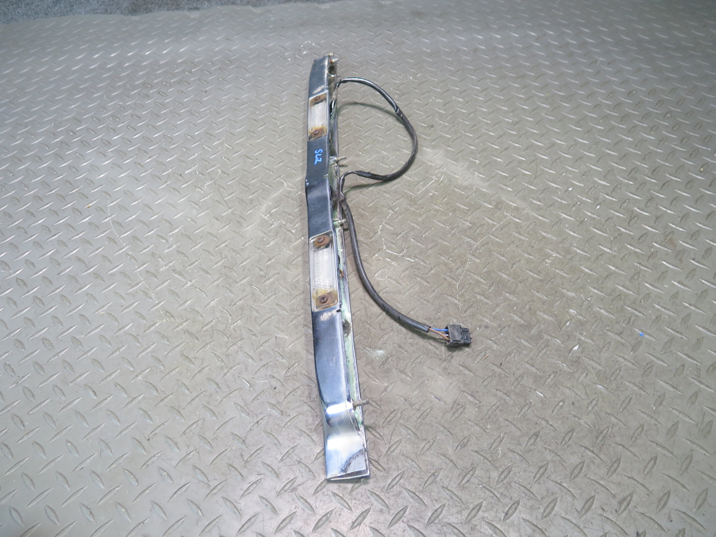 73-89 Mercedes R107 Rear Trunk Lid License Plate Light Chrome Molding Set OEM