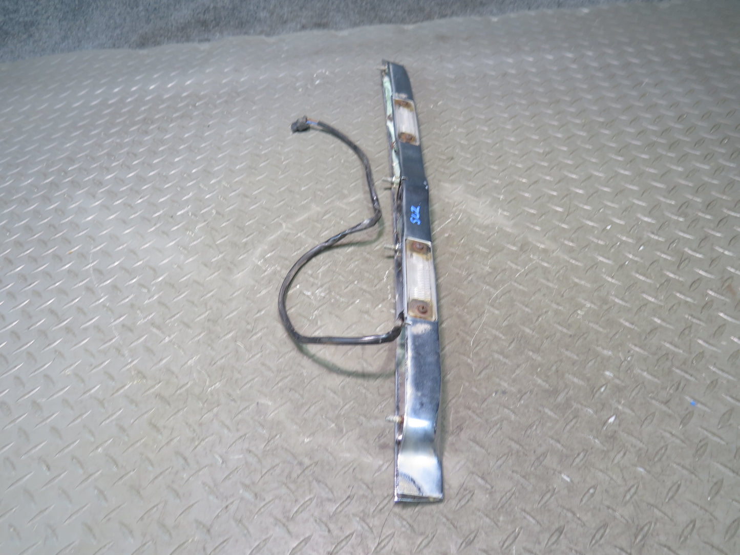73-89 Mercedes R107 Rear Trunk Lid License Plate Light Chrome Molding Set OEM