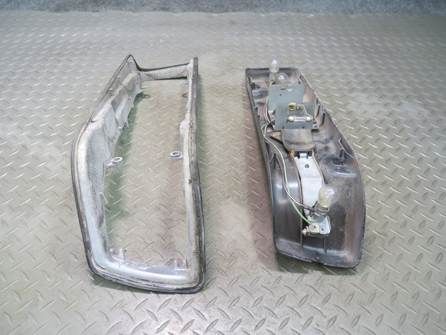73-89 Mercedes R107 SL Rear Left Driver Side Tail Bracket & Frame Light Lamp OEM