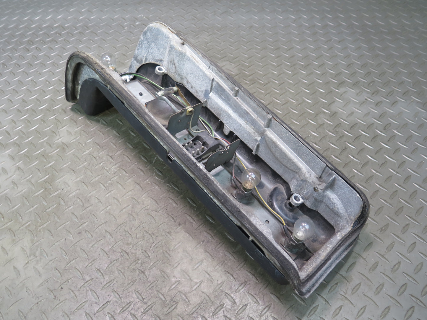 73-89 Mercedes R107 SL Rear Left Driver Side Tail Bracket & Frame Light Lamp OEM