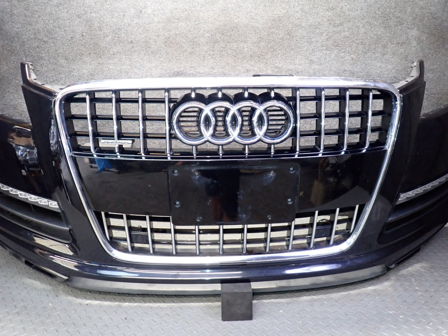 10-15 Audi 4L Q7 Front Bumper Cover w Grille PDC Sensors & Fog Lights Black OEM