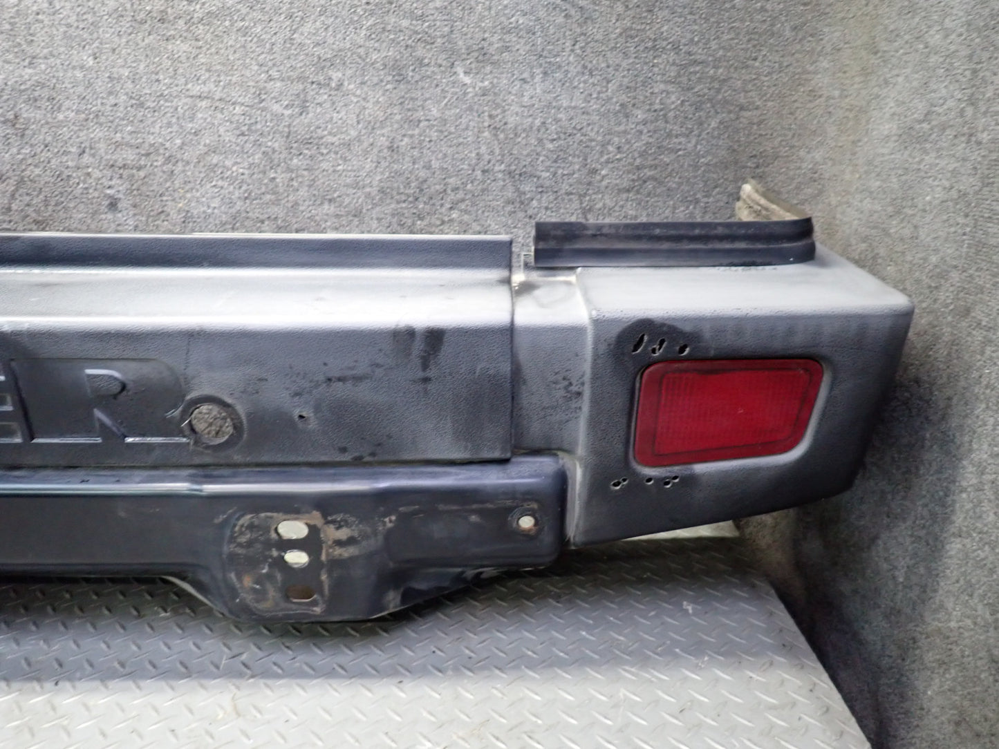 2003-2005 Hummer H2 Rear Bumper Cover Black w Lights