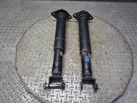 06-09 Nissan 350Z Z33 Set of 2 Rear Left & Right Strut Shock Absorber OEM
