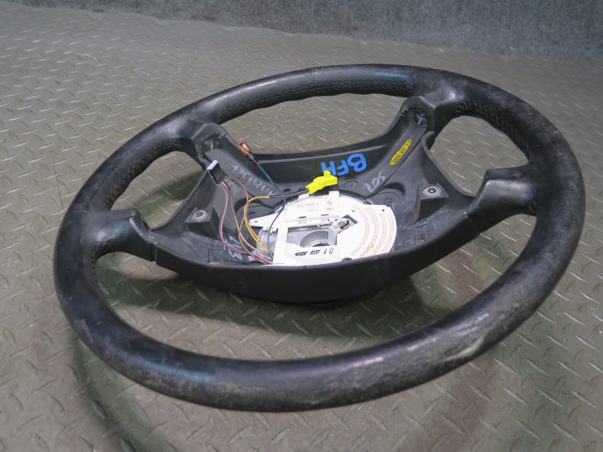 97-99 BMW E39 540i 4 Spoke Leather Steering Black 1094259 Damaged