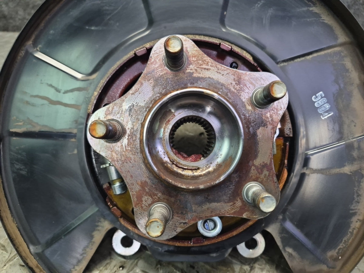 10-20 Nissan 370Z Z34 Rear Left Spindle Knuckle Wheel Hub Bearing OEM