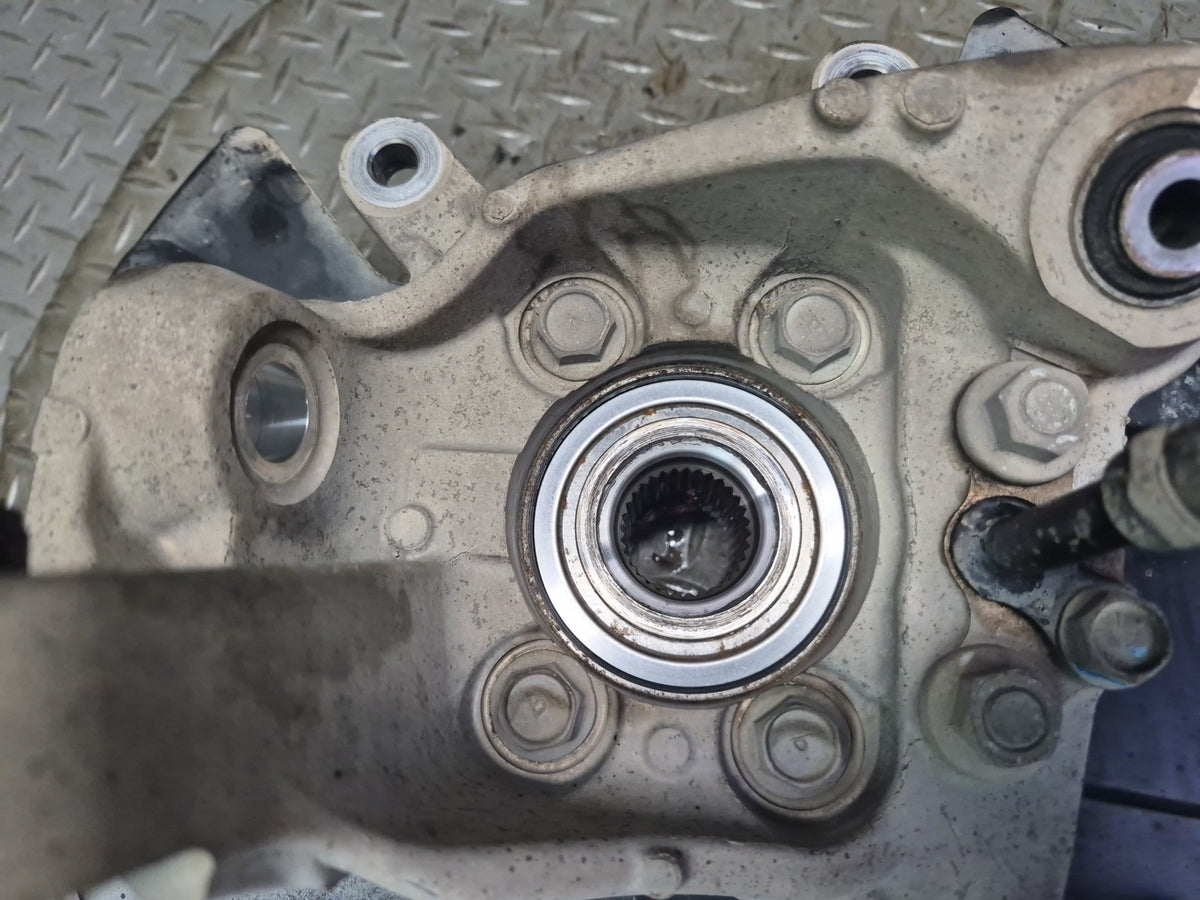 10-20 Nissan 370Z Z34 Rear Left Spindle Knuckle Wheel Hub Bearing OEM
