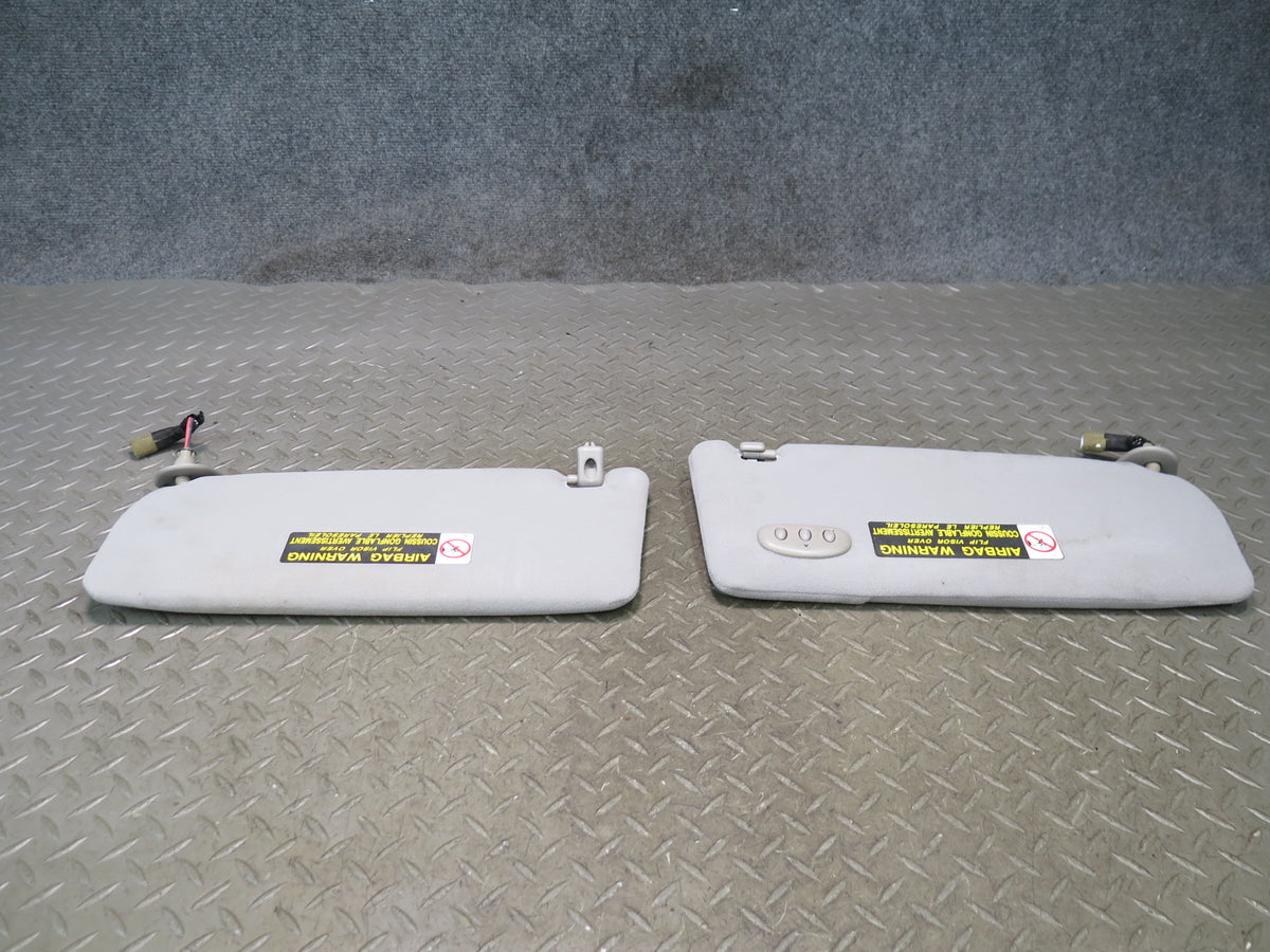02-05 Lexus JCE10L IS300 Set of 2 Front Left & Right Sun Visor w Homelink OEM