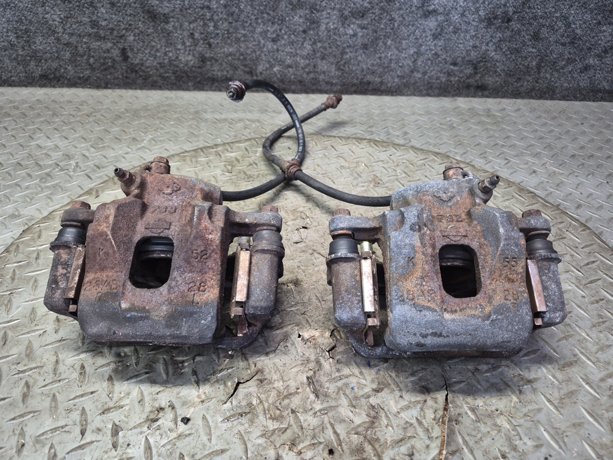 84-89 Nissan Z31 300ZX NA Set of 2 Front Left & Right Brake Caliper w Hose OEM