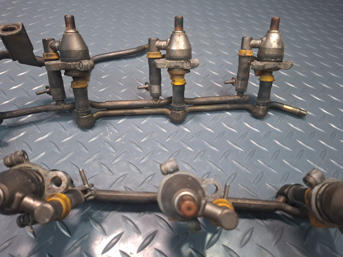 87-89 Nissan Z31 300ZX VG30E NA Fuel Rail Injector Set OEM
