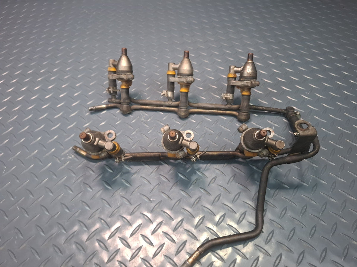 87-89 Nissan Z31 300ZX VG30E NA Fuel Rail Injector Set OEM