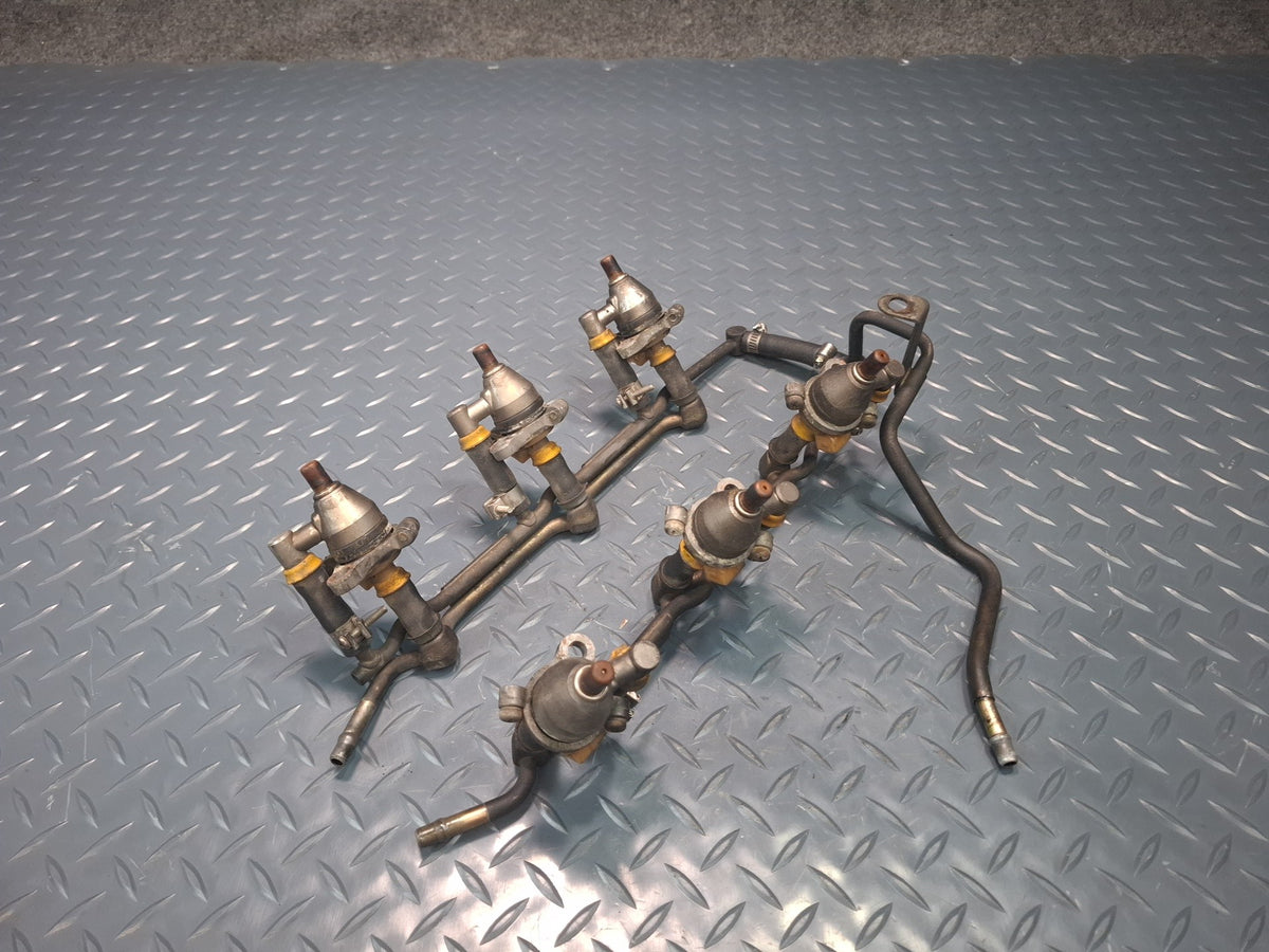 87-89 Nissan Z31 300ZX VG30E NA Fuel Rail Injector Set OEM