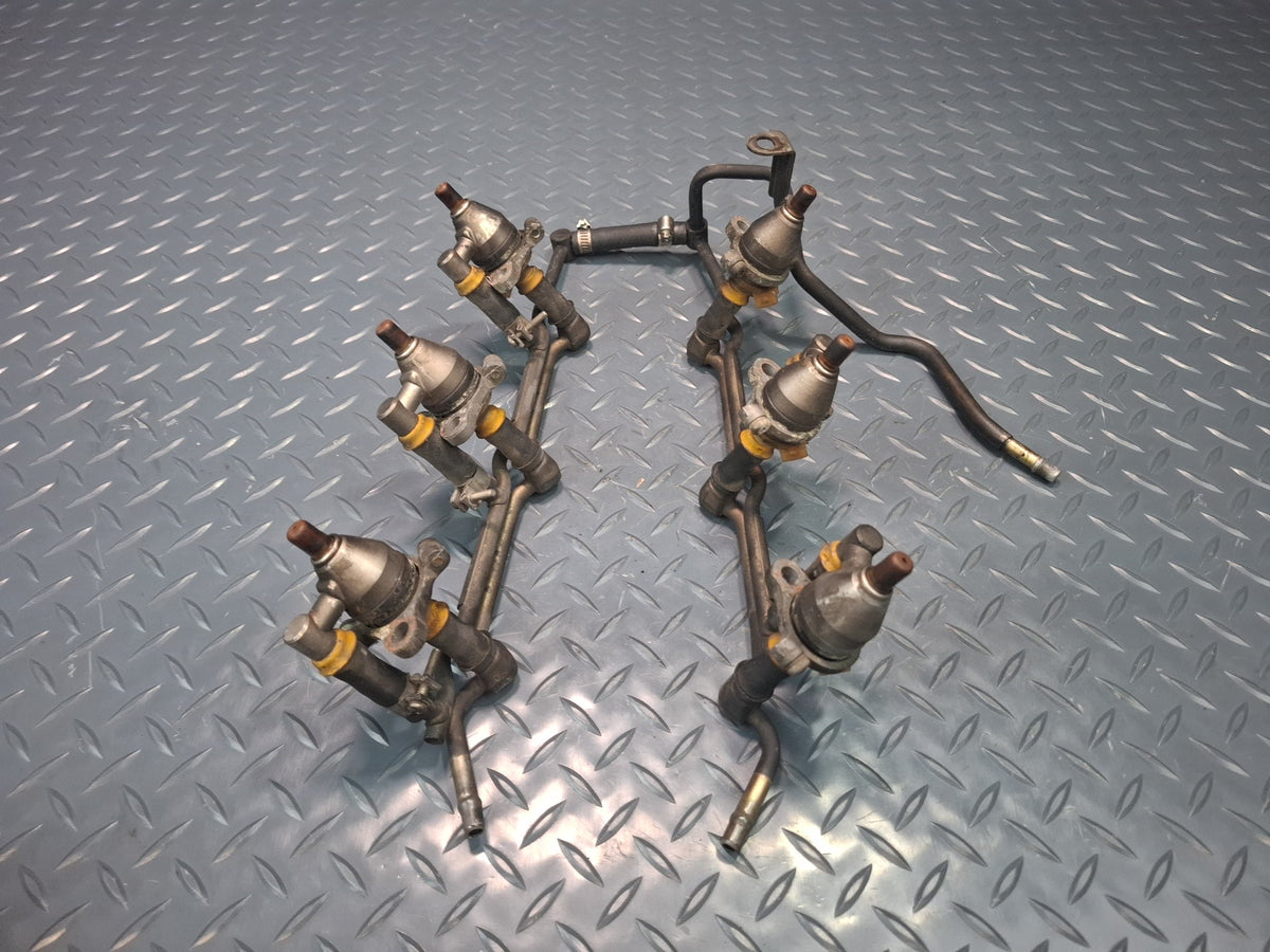 87-89 Nissan Z31 300ZX VG30E NA Fuel Rail Injector Set OEM
